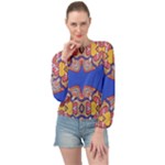 Yellow red shapes on a blue background                                                         Banded Bottom Chiffon Top