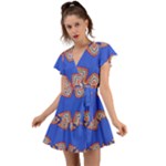 Yellow red shapes on a blue background                                                          Flutter Sleeve Wrap Dress