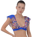 Yellow red shapes on a blue background                                                          Plunge Frill Sleeve Bikini Top