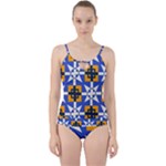 Shapes on a blue background                                                          Cut Out Top Tankini Set