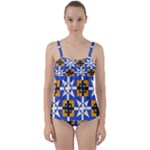 Shapes on a blue background                                                          Twist Front Tankini Set