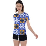 Shapes on a blue background                                                           Back Circle Cutout Sports Tee