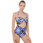 Shapes on a blue background                                                          Scallop Top Cut Out Swimsuit