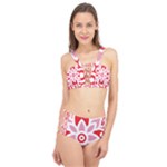 A Red And White Pattern With A Flower On It Cage Up Bikini Set