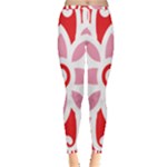 A Red And White Pattern With A Flower On It Inside Out Leggings