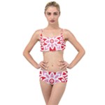 A Red And White Pattern With A Flower On It Layered Top Bikini Set