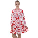 A Red And White Pattern With A Flower On It All Frills Dress