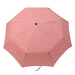 A Red And White Background With A Pattern Folding Umbrellas