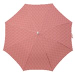 A Red And White Background With A Pattern Straight Umbrellas