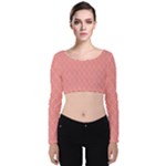 A Red And White Background With A Pattern Velvet Long Sleeve Crop Top