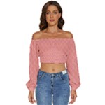 A Red And White Background With A Pattern Long Sleeve Crinkled Weave Crop Top