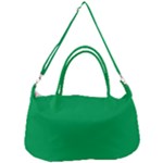 A Green Background With A White Border Removable Strap Handbag