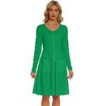 A Green Background With A White Border Long Sleeve Dress With Pocket