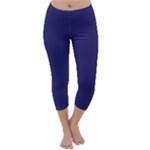 A Blue Background With A Clock On It Capri Winter Leggings 