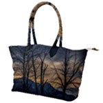 Tree silhouette at border of nahuel haupi lake, rio negro, argentina Canvas Shoulder Bag