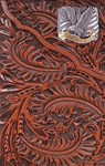 Worked leather with metal eagle inlay