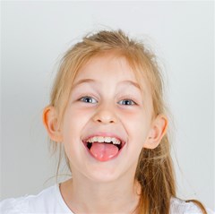 little girl showing tongue white shirt2