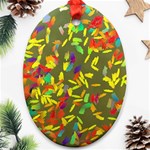 Colorful brush strokes painting on a green background                                                    Ornament (Oval)