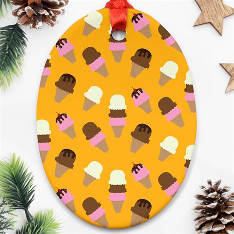 Ice cream on an orange background pattern                                                             Ornament (Oval) from ArtsNow.com Front