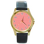 A Red And White Background With A Pattern Round Gold Metal Watch