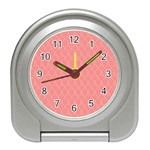 A Red And White Background With A Pattern Travel Alarm Clock