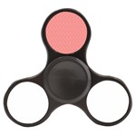 A Red And White Background With A Pattern Finger Spinner