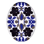 A Design Of A Blue And Black Flower Oval Glass Fridge Magnet (4 pack)