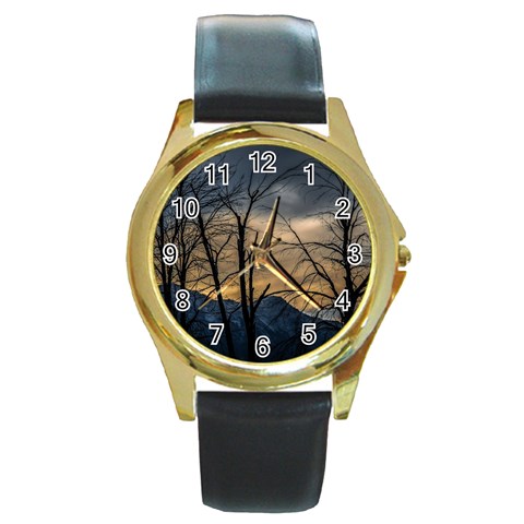 Tree silhouette at border of nahuel haupi lake, rio negro, argentina Round Gold Metal Watch from ArtsNow.com Front