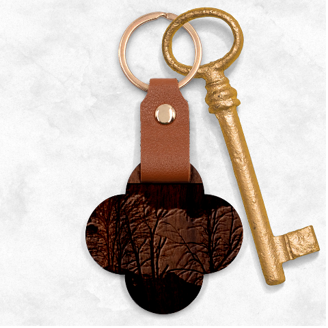 Tree silhouette at border of nahuel haupi lake, rio negro, argentina Engraved Wood Key Chain from ArtsNow.com Front