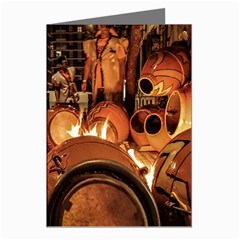 Candombe drums being tempered, montevideo, uruguay Greeting Cards (Pkg of 8) from ArtsNow.com Left